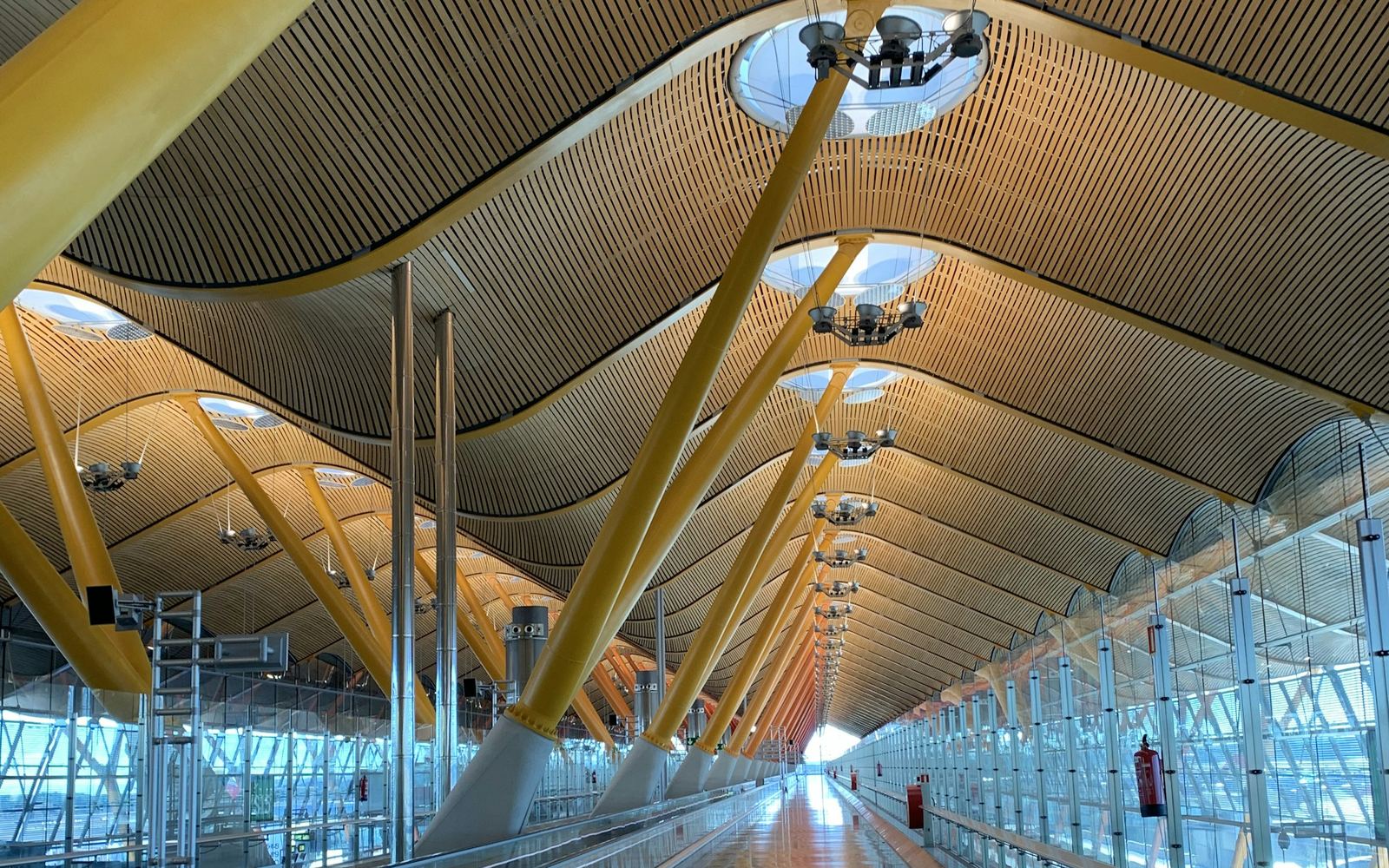 An empty airport terminal corridor